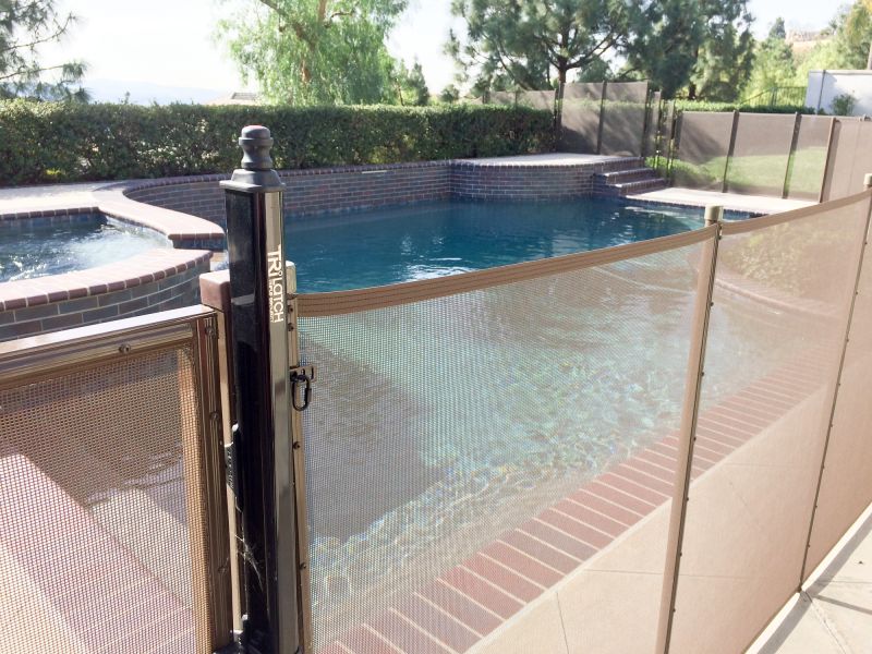 Mesh Fence Securing Pool Area